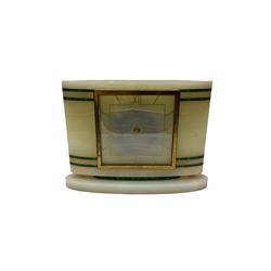 Smiths Industries SEC mains electric driven mantle clock in a rectangular Art Deco alabaster case inlaid with contrasting horizontal malachite inlay to the front, 4-1/2” square dial with brass roman numerals at 12, 3 , 6 and 9 and baton hands, with a square brass bezel and flat glass. Wiring untested, sold as a decorative item.
H 19 cm W 25 cm D 7 cm
With a small eight-day table clock in a faux tortoise shell case on a silver-plated base, 2” white dial with Arabic numerals and minute markers, steel spade hands, balance wheel movement with integral winding key. 
H 9.5 cm W 12 cm D 4 cm
