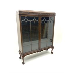 Early 20th century mahogany display cabinet, four adjustable shelves, raised on cabriole supports and ball and claw feet