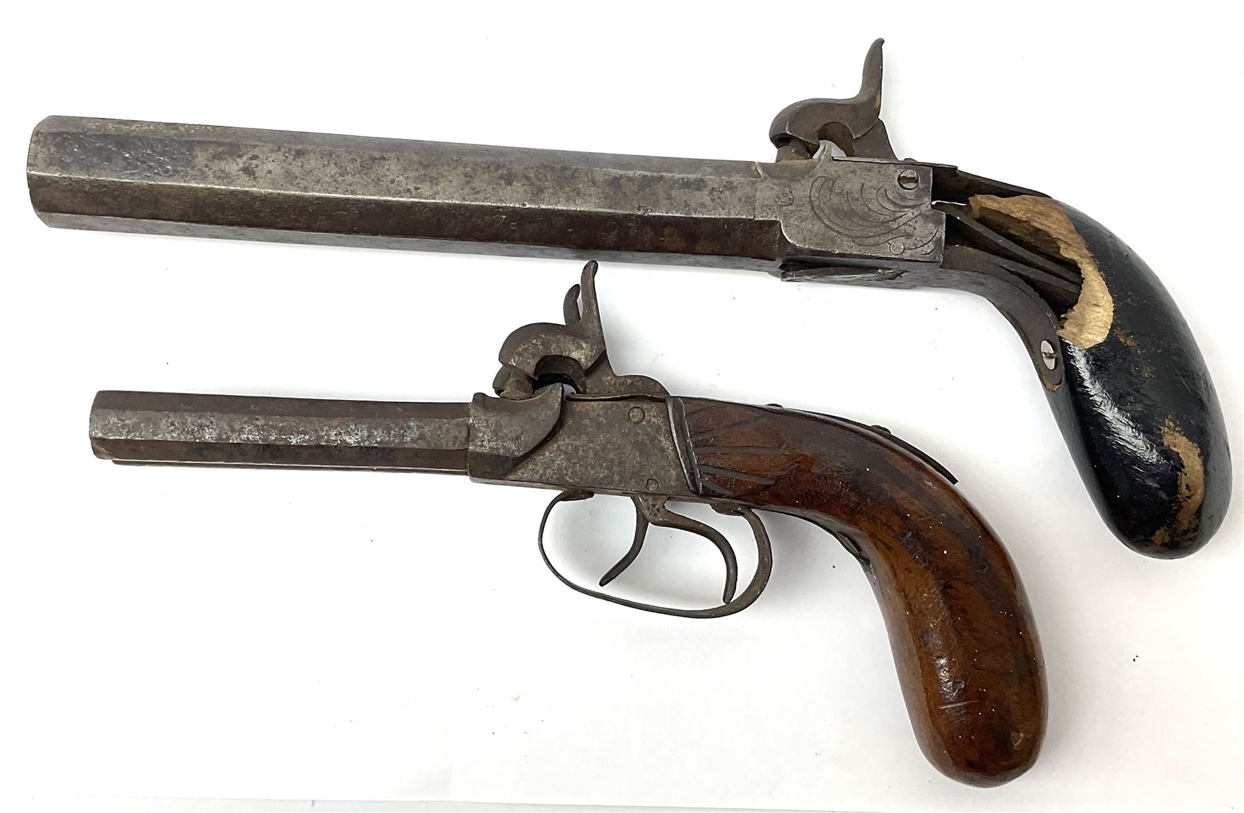 Mid-19th century percussion cap side-by-side double barrel pocket pistol with 7.5cm octagonal barrels and walnut bag stock L21.5cm; and Belgian 16-bore percussion cap pocket pistol with 16cm octagonal barrel, folding trigger and black painted wooden stock L27.5cm (2)