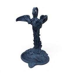 After Coalbrookdale cast iron heron stick stand, ornate detail with fish base, painted in matt black, 20th century