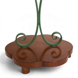 Art Deco stand, with scalloped wooden shelf, within green painted metal frame with scroll detail, upon a scalloped base, H75cm