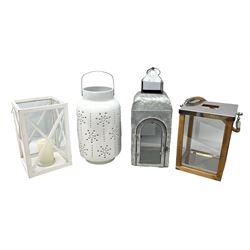 Collection of four modern candle lanterns, to include two metal examples, one metal and one ceramic one, tallest example H52cm