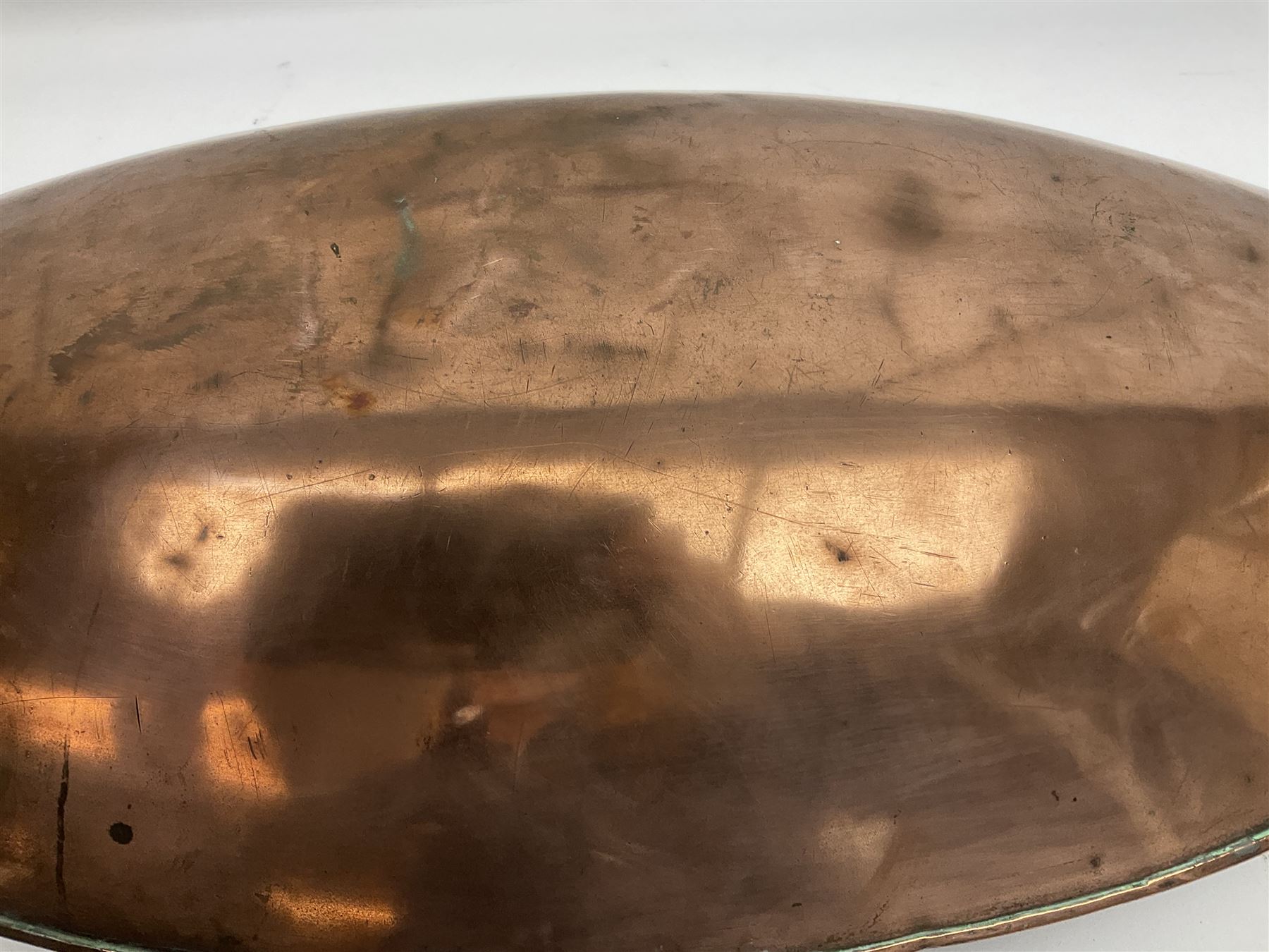 Victorian copper carriage foot warmer of flattened oval form with two carrying handles, L70cm