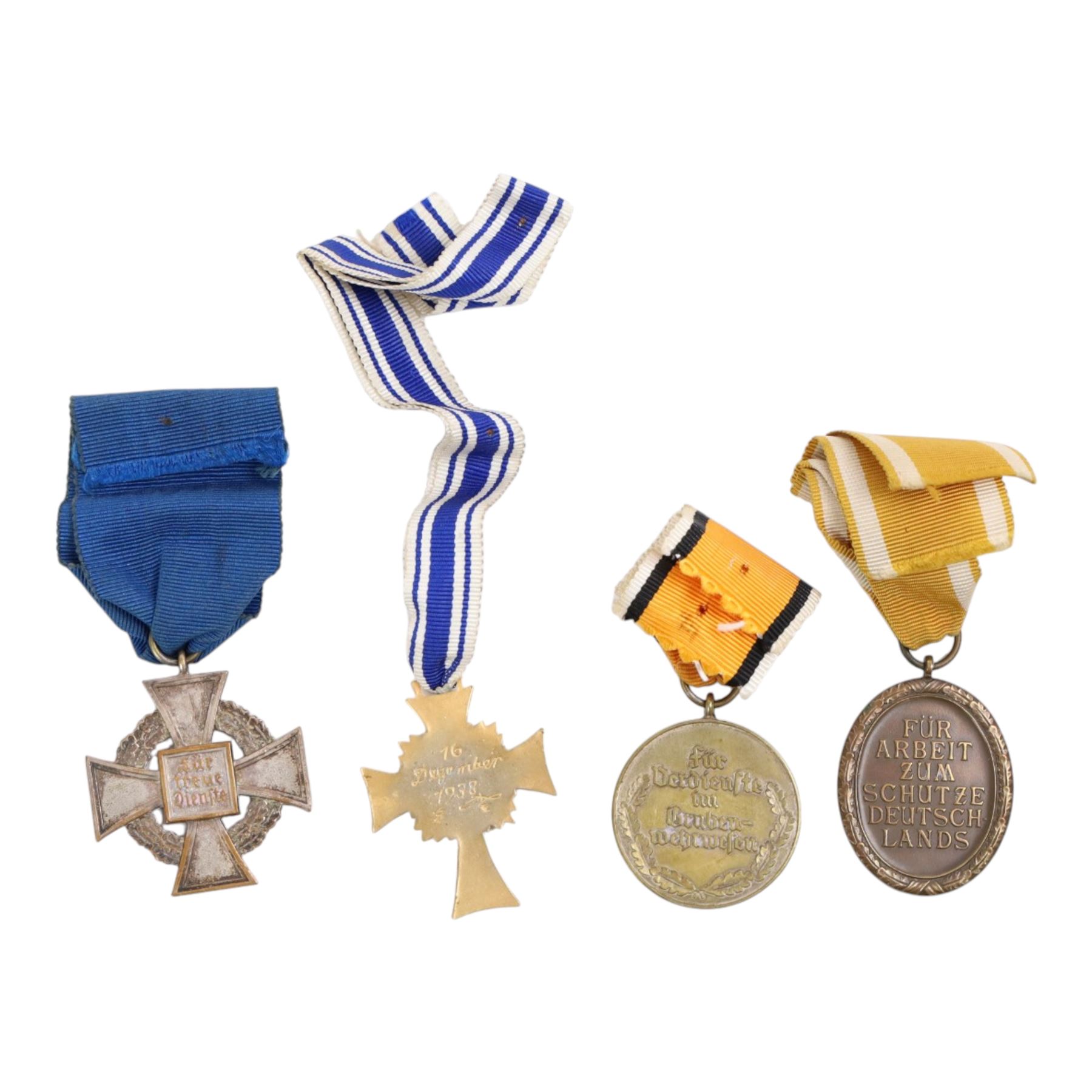 WWII German medals, comprising Cross of the Honour of the German Mother, gold, Westwall medal, Mine Service medal and Faithful Service medal