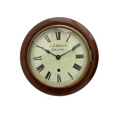  A compact early 20th century mahogany cased wall clock with an 8” painted dial c1910, with Roman numerals, minute track and steel spade hands, spun brass bezel and silver sight ring, eight day going barrel timepiece movement. Dial inscribed J.J. Dent, Brigg, (North Lincolnshire) With pendulum and key.



