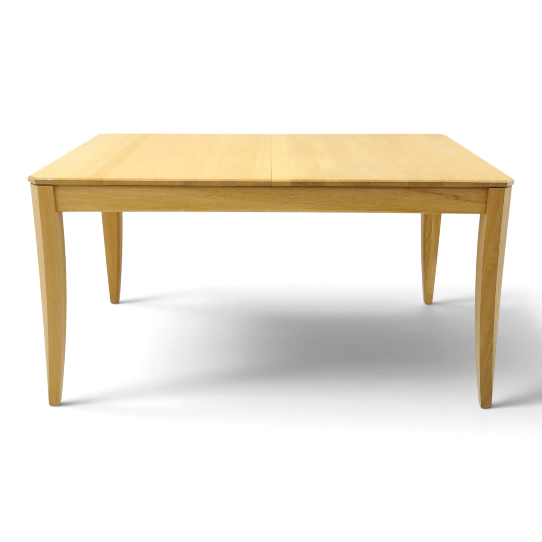 Ercol - 'Artisan' light oak extending dining table, rectangular top with canted corners, with stowable leaf extending the table to 193cm, shaped faceted supports