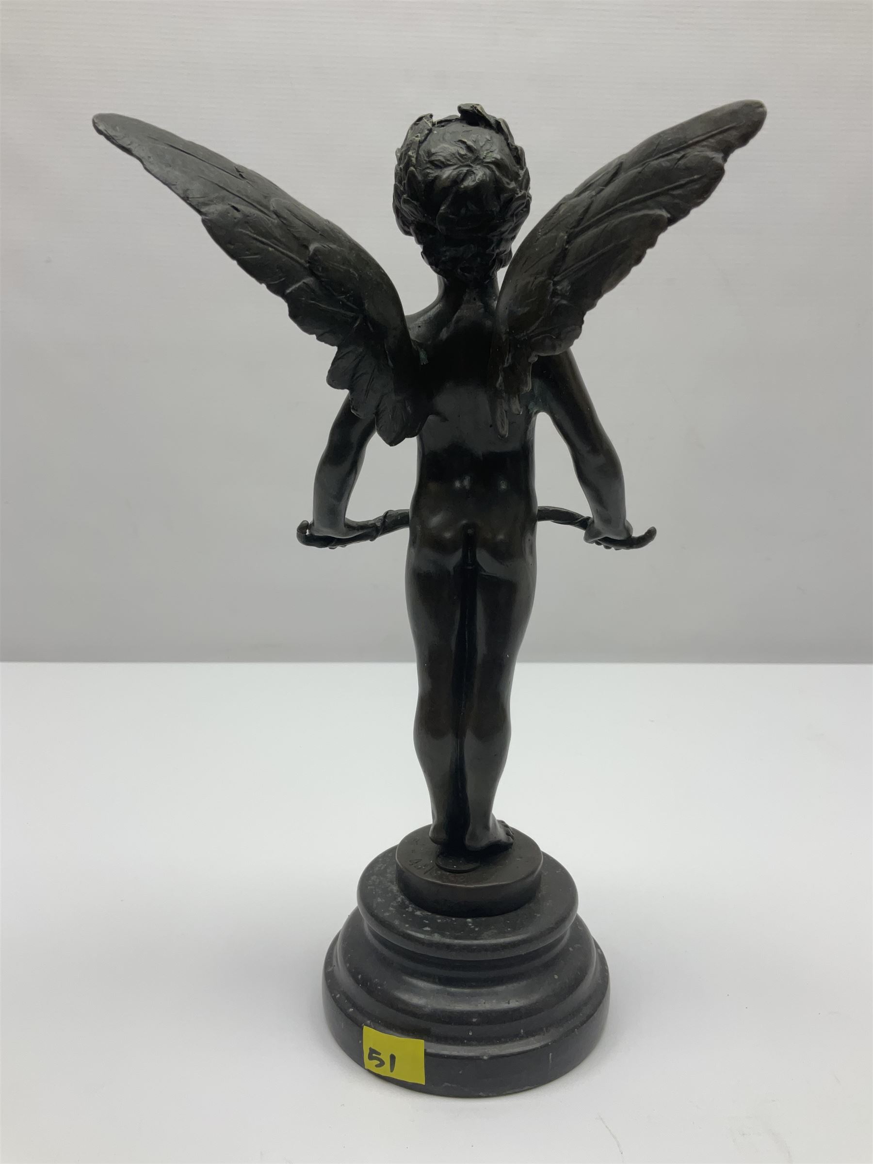 After Moreau, bronzed figure modeled as an angel holding a bow, with foundry mark upon socle base, H30cm