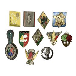 Eleven French Foreign Legion badges including various para, infantry and artillery (some copies)