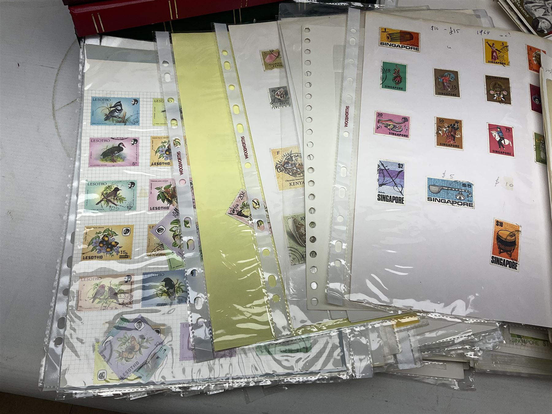 Stamps including Queen Victoria Queensland, modern Australia, King Edward VII Ceylon and Mauritius, South Africa, Gambia, Falkland Islands, Gold Coast, Ireland etc, housed in seven albums/folders and on loose album pages, in one box