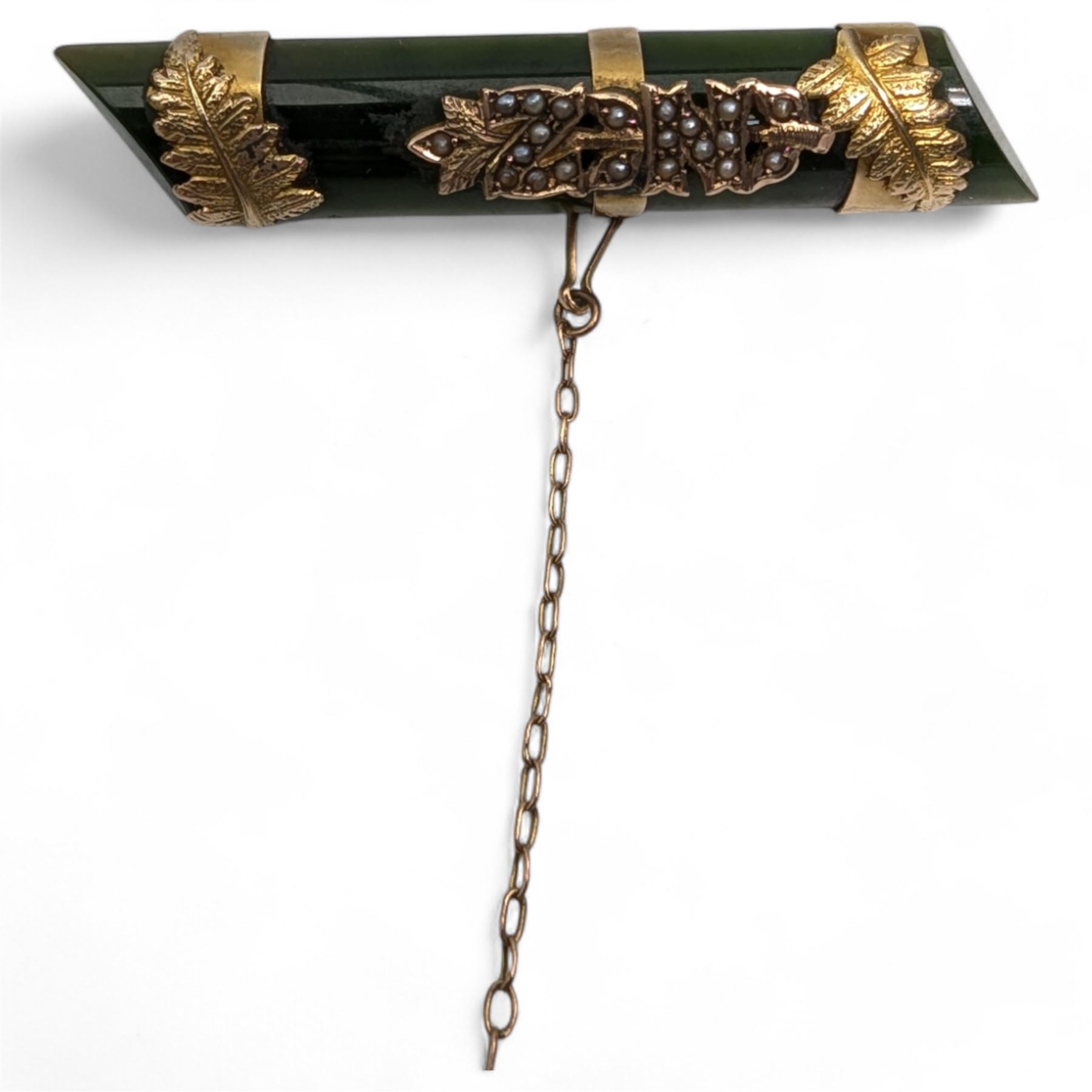 Gold green stone set pendant and brooch, gold pearl and red paste stone brooch and clip, all 9ct and a gold simulated pearl ring 