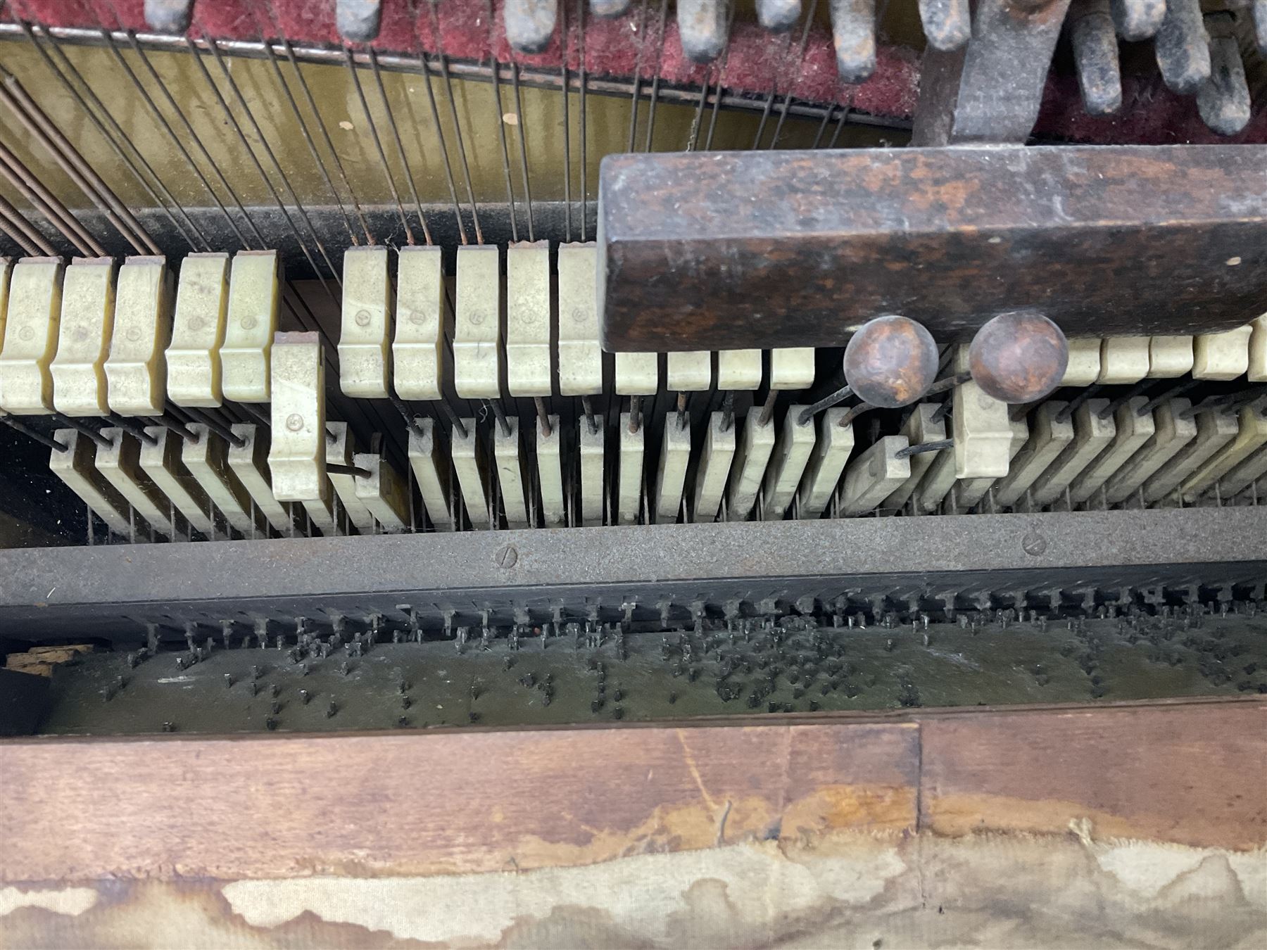 Faventia Half size miniature Spanish barrel piano with a 40cm cylinder playing tunes on a 37 note movement including woodblock and triangle, in a painted case with silk embroidered decoration to the front.  Vicente Linares, Barcelona trade label, with original crank handles, stringing, hammers action, tuning pins and cylinder