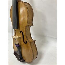 Copy of a full size Stradivarius violin, with an ebonised fretboard, tailpiece and tuning pegs, with a polished chin rest  Length 60cm