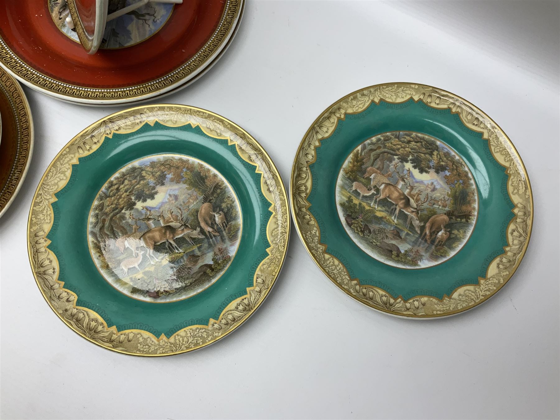 19th century Prattware table ware to include an oval footed dish decorated with a scene after Landseer 'Highland Music', retailed by James Muggleton L27.5cm, ‘The Truant’ plate after T. Webster, 'Blind Man's Buff' & 'Snap Dragon' tea plate, two side plates with malachite printed borders and others (17)