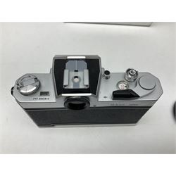 Nikkormat FT2 camera body, serial no. 5066813, in original packaging, together with Nikkormat EL camera body, serial no. 5577358, with Nikon Nikkor 50mm 1:1.8' lens no. 2143575, Nikkormat FT, serial no. 3968385, and Nikomat FT camera body, serial no. 4015491