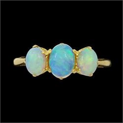 Gold opal three stone ring, stamped 18ct