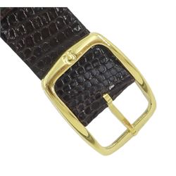 Omega gentleman's 9ct gold automatic wristwatch, silvered dial with baton hour markers and date aperture, on Omega brown leather strap, with Omega gold-plated buckle, boxed