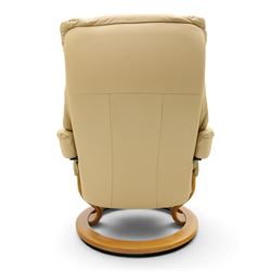 Ekornes Stressless - beech framed reclining swivel armchair with matching footstool, on U-shaped supports with circular bases, upholstered in beige leather