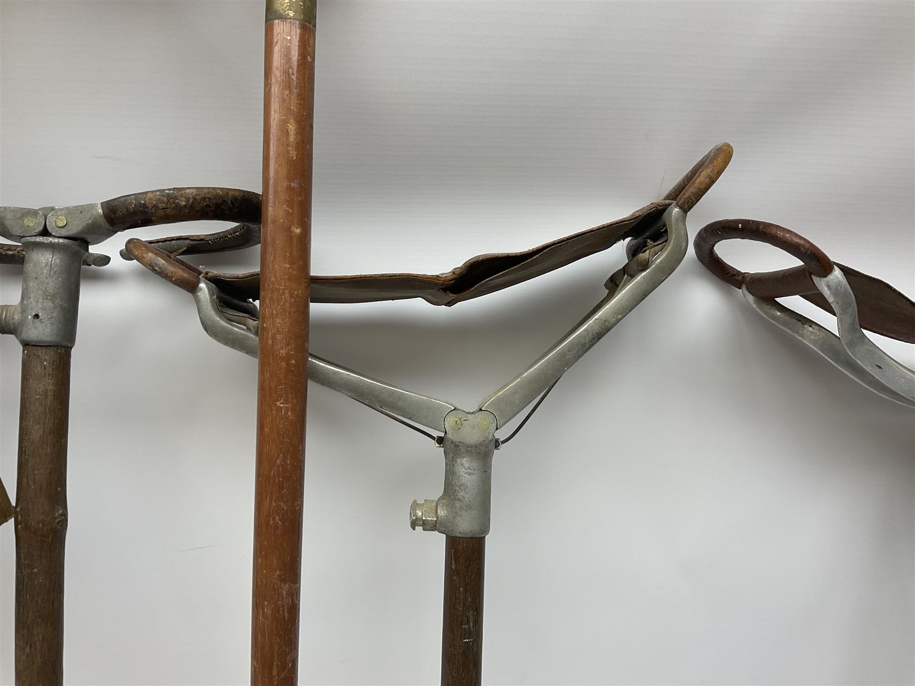Adjustable Gamebird shooting stick, together with Mills Munitions shooting stick, Featherwate shooting stick, five others and two wooden walking sticks.  