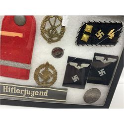 WW2 German Don Cossack epaulettes; and quantity of German insignia including SA Sports Badge for war wounded, Hitler Youth badge, Young Cossacks badge, Wound badge, Hitler Youth cuff title etc; in glass topped display box.