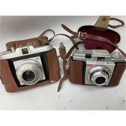 Cameras and camera equipment, including Kodak Retinette 1A, Polaroid J33 land camera, Kodak Colour snap 35, Agfa Isola I, three tripods etc,  