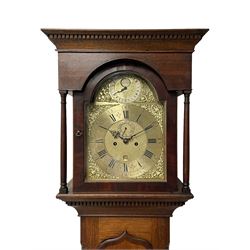 John Greaves of Newcastle - Mid-18th century 8-day oak longcase clock with a flat top, double cornice and break arch hood door flanked by two turned pilasters, trunk with canted corners and a spire topped door with crossbanding, rectangular plinth raised on bracket feet, brass dial with cast spandrels and penny-moon dial and pointer to the arch, matted dial centre with a silvered chapter ring and seconds ring, chapter with Roman numerals, five minute Arabic's, minute and quarter tracks, square date aperture and fettled steel hands, dial pinned to a rack striking movement with a recoil anchor escapement. With pendulum and weights.
