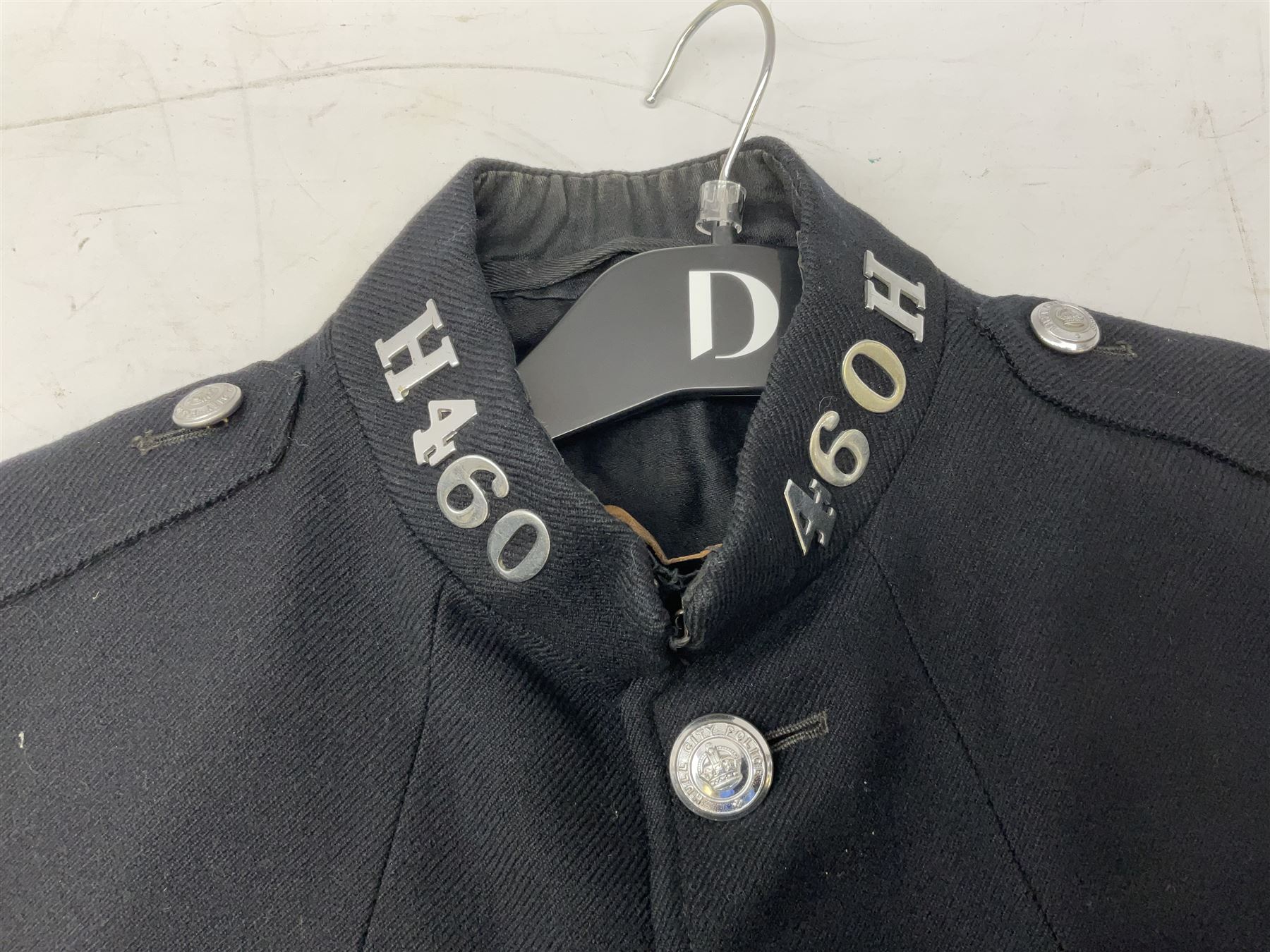 Hull City Police - vintage tunic with matching cape, collar no.H460; another tunic with WW2 medal ribbon bar; early sergeant's tunic; and later sergeant's tunic (5)