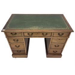 19th century mahogany twin pedestal office desk, moulded rectangular top with green leather inset, fitted with nine drawers, on plinth base