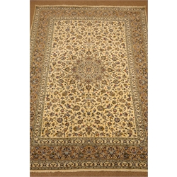  Persian Kashan ivory ground rug, trailing floral pattern with central medallion, repeating border, 342cm x 245cm  