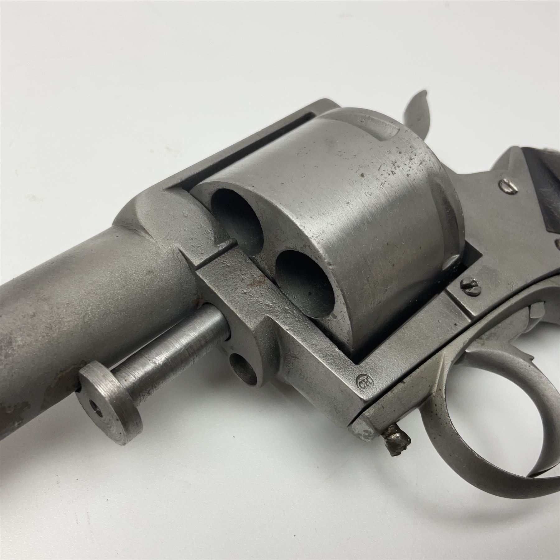 The major parts only of a British Bull-Dog .500 Boxer five-shot revolver comprising stripped down framework, cylinder, trigger with guard, functioning hammer and two-piece chequered grip; retailed by G. Goth Buenos Ayres; Belgian proof marks; L19.5cm overall; in fitted mahogany case 