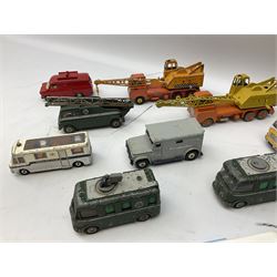 Dinky - thirteen unboxed and playworn die-cast commercial vehicles including two Supertoys 20-Ton Lorry-Mounted Cranes; Leyland Octopus Tanker; Fire Engine No.955; Extending Mast Vehicle No.969; two TV Roving Eye Vans No.968; three Ford Transit Vans; Brinks Armoured Car No.275; etc