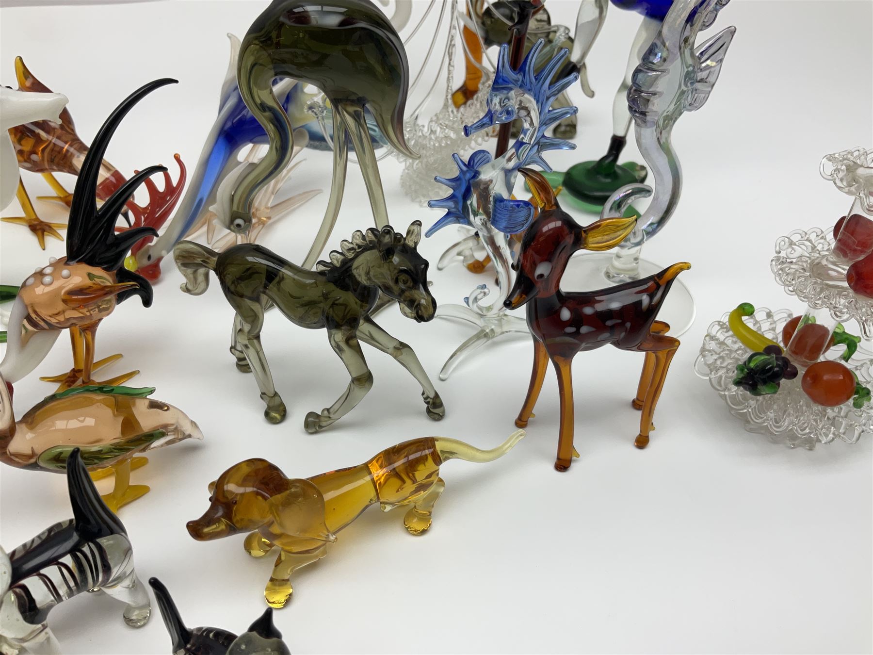 Large collection of hand-blown glass animals and figures, to include fish, birds, cats, dogs, monkeys etc