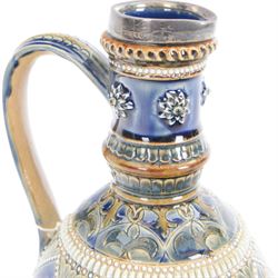 Doulton Lambeth ewer with silver collar, hallmarked, by Elizabeth Sayers, decorated with a central panel of flowers, H25cm