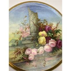 19th century porcelain stand, of circular form, in the Derby style, hand painted with a ruinous column and roses against a landscape background, within a gilt border, D7cm