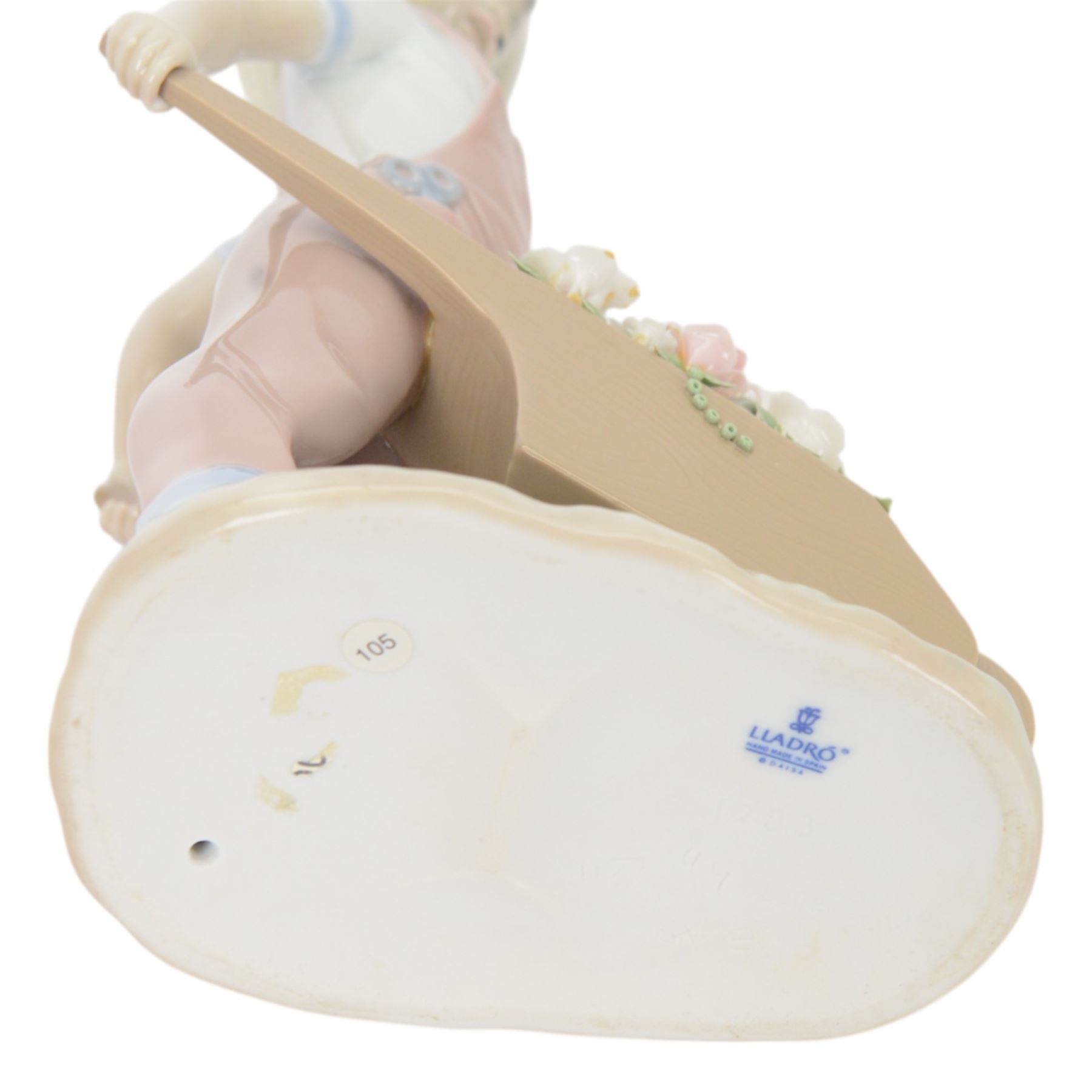 Three Lladro figures, comprising Spring Awakening 1283, Flower Harmony 1418 and Dutch girl with Tulips 5065