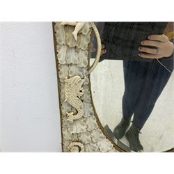 Pair 19th century French Dieppe bone and ivory wall mirrors, the oval bevelled mirror plates within rectangular frames with shaped tops, profusely decorated with ivory leaves, further detailed with carved bone armorial type crest inscribed 'SGOTORVM', putti, fish and mask heads, H81cm W48cm