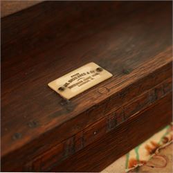 James Shoolbred & Co. (1814-1934) - Arts & Crafts high-back oak settle or hall-bench, the projecting cresting rail over a frieze decorated with stylised poppy pewter inlays, the drop-in sprung seat beneath high back and arms, flanked by tapering uprights terminating to shaped stile feet, upholstered in Archibald Knox patterned fabric with the original tapestry and horsehair upholstery beneath, applied plaque by James Shoolbred to underside, with stamped serial number W1573, circa 1890