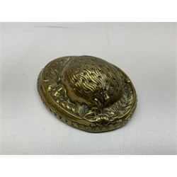 W Avery & Son brass oval pincushion in the form of a hedgehog, and horseshoe needle packet box both inscribed to base 'W. Avery and Son, Redditch', with registration mark, pin cushion L9cm 