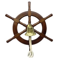 Modern six spoke ships wheel with brass bell