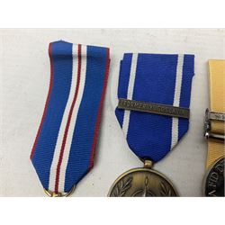 NATO Service Medal with clasp for Former Yugoslavia; together with three copy medals - Iraq Medal with clasp for 19 Mar to 28 Apr 2003 and unfitted rosette; Operational Service Medal with Afghanistan clasp; and QEII Golden Jubilee 2002 medal; all with ribbons (4)