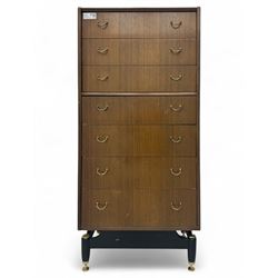 G-Plan teak tallboy, seven drawer chest with brass loop handles, ebonise base with adjusta...