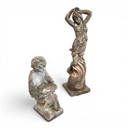 Two composition stone garden figures, comprising a seated boy figure and a standing classical draped female figure, each on square base, weathered painted finish.