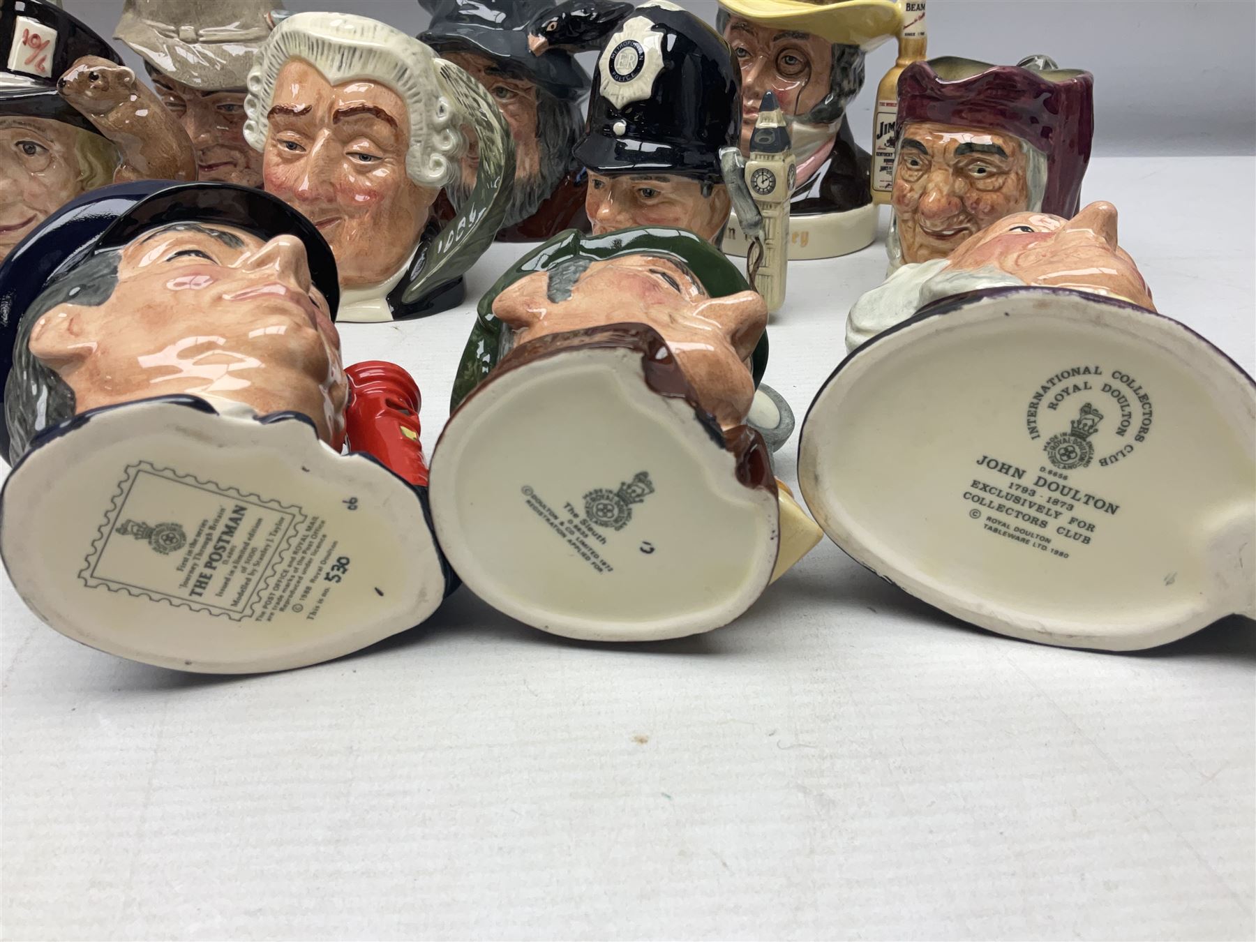 Large collection of Royal Doulton miniature character jugs, to include The Postman D6801, The London 'Bobby' D6762, Old Salt, D6554, Sir Henry Doulton D6703 etc  