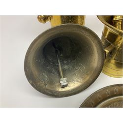 Four brass pestle and mortars, to include two miniature examples, together with other brassware including four branch candleabra, bells etc