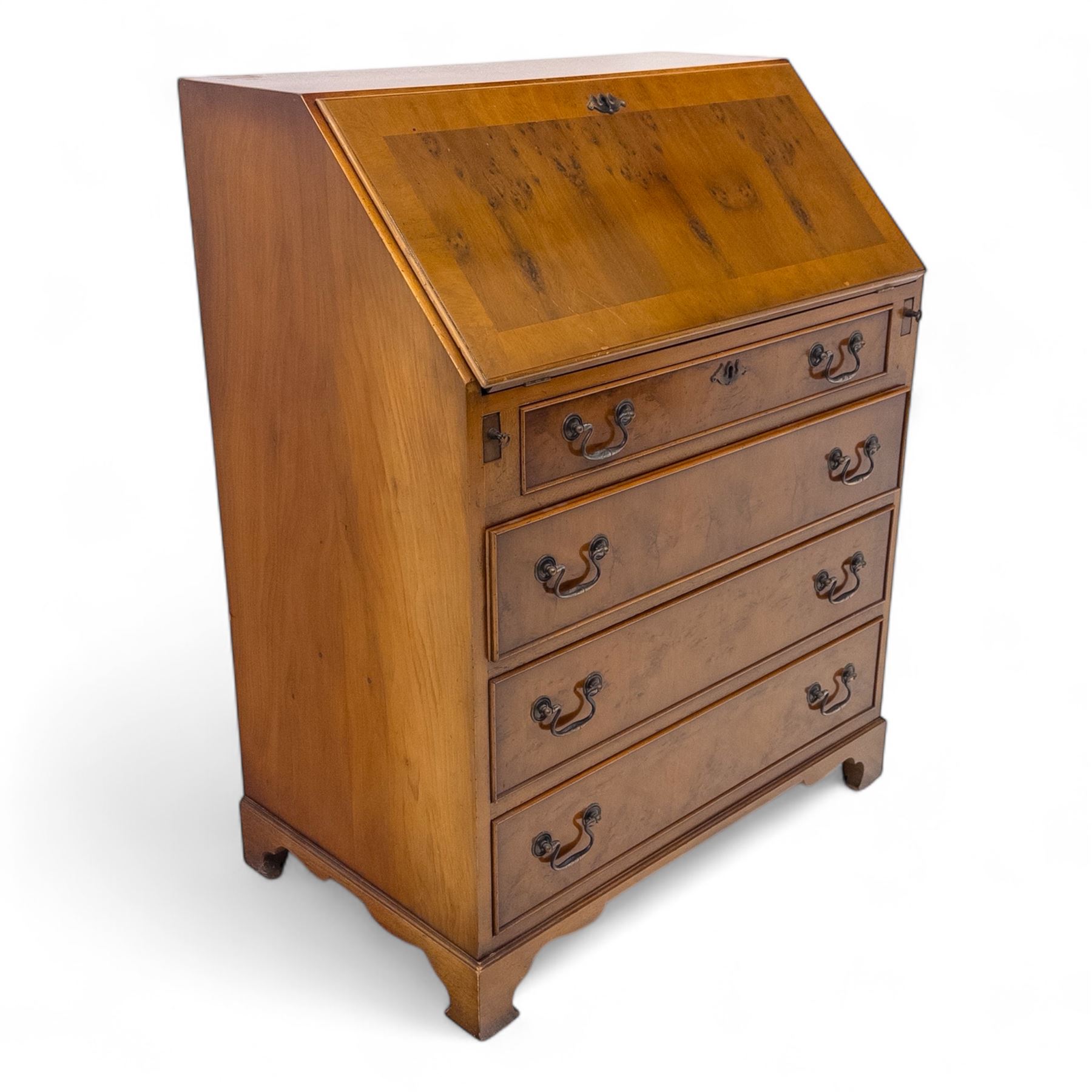 Mid-20th-century Georgian design cherrywood and burr walnut  veneered bureau, fall front with inset tooled leather writing surface revealing a fitted interior with small drawers and pigeon holes, and a central cupboard with oval inlay, over four long graduated drawers, raised on shaped bracket feet 
