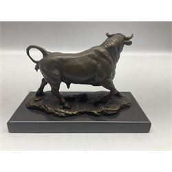 Bronze figure, modelled as a prancing bull, upon a naturalistic base signed Mils and with foundry mark, raised upon a rectangular marble base, overall H14cm