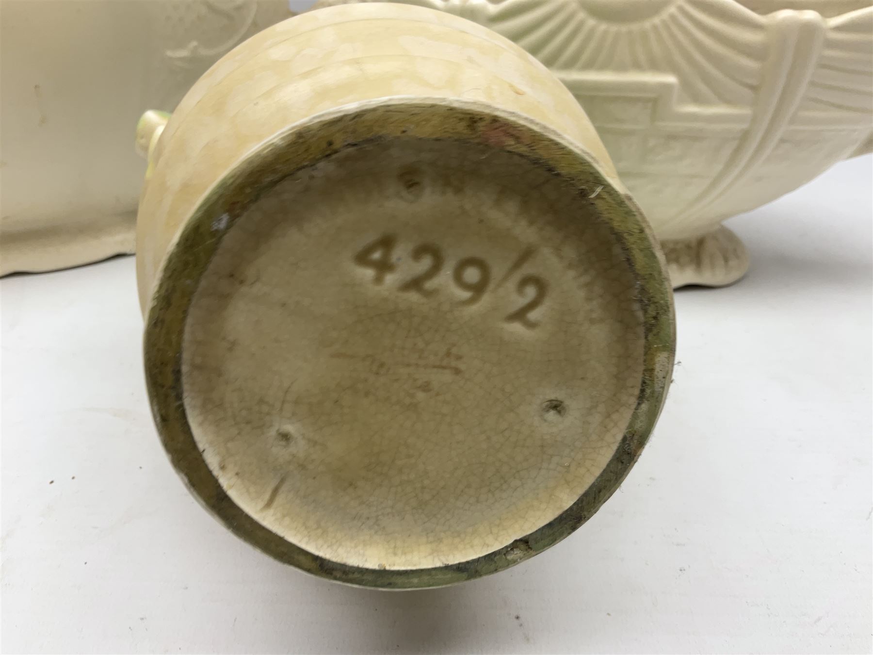 Two Arthur Wood twin handled vases to include one example in the Garden Wall pattern, together with a Beswick Ware merging green, yellow and cream vase, all with marks beneath, tallest H23cm