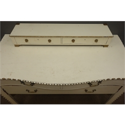  French style dressing table, two small trinket drawers above serpentine front, two drawers, cream and gold finish, W122cm, H90cm, D60cm  