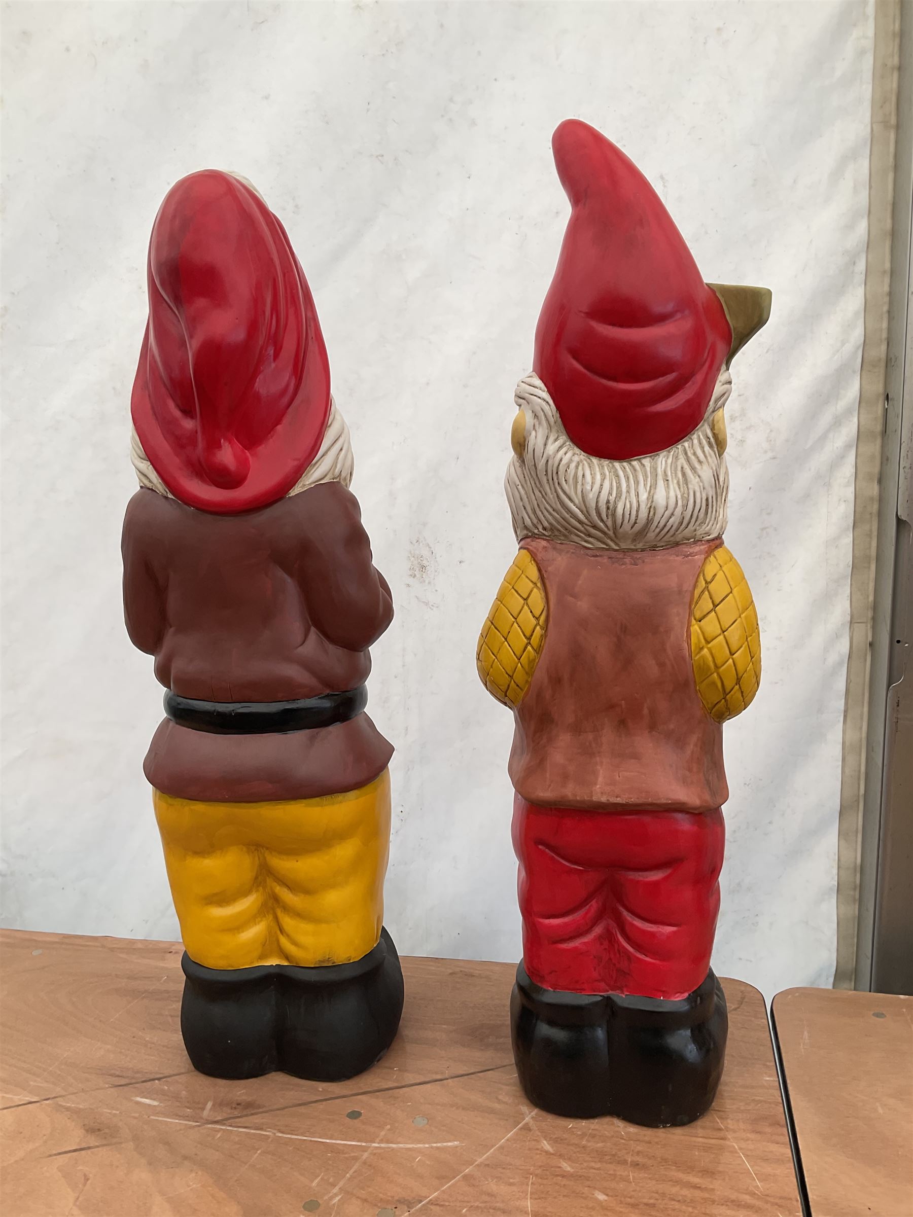 Pair of large indoor or outdoor painted garden gnomes  - THIS LOT IS TO BE COLLECTED BY APPOINTMENT FROM DUGGLEBY STORAGE, GREAT HILL, EASTFIELD, SCARBOROUGH, YO11 3TX