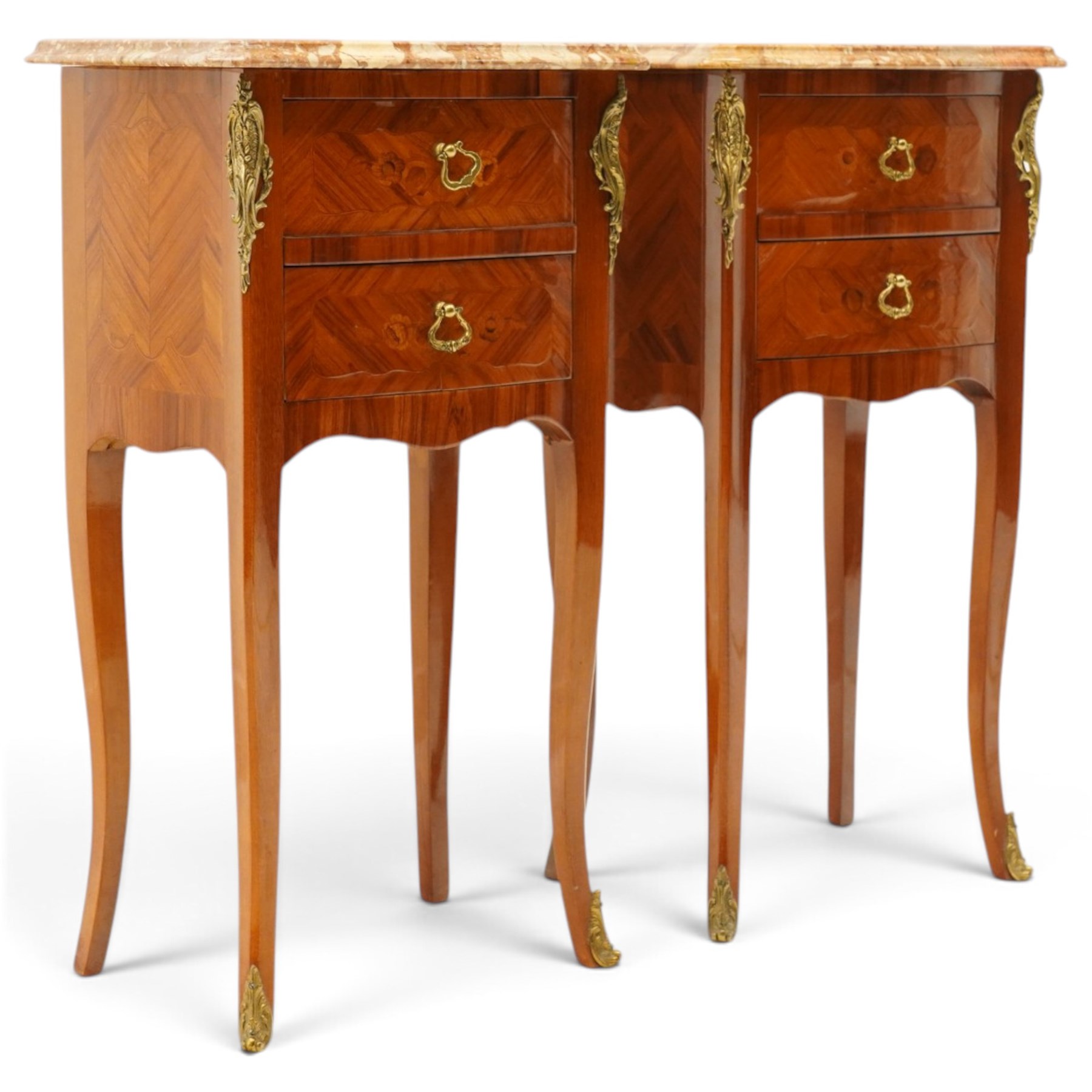 Pair of French inlaid kingwood marquetry bedsides, the shaped marble top over two drawers flanked by gilt metal rocaille mounts, raised on tapering cabriole supports
