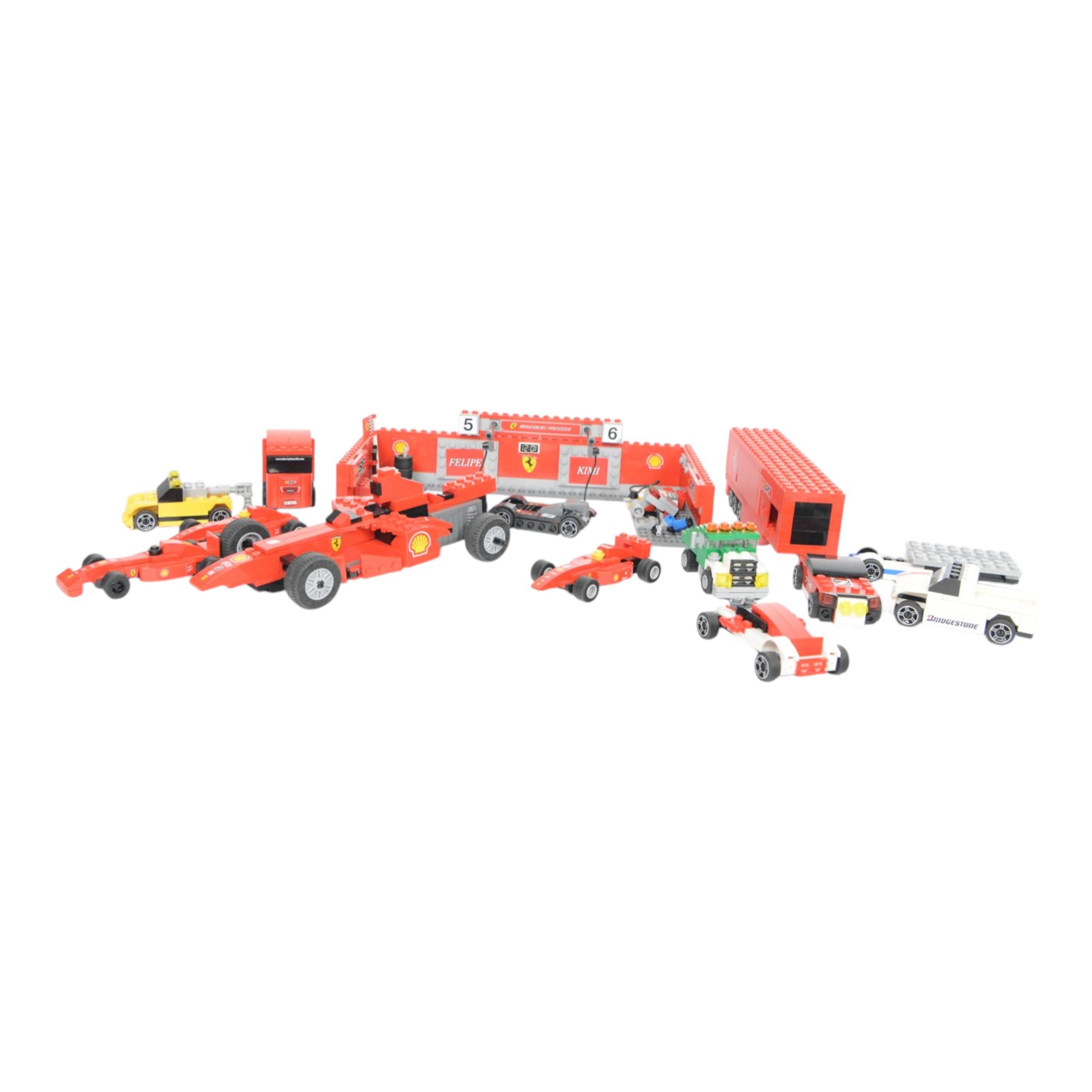 Lego Racers set Ferrari F1 Pit no. 8155, further racing related Lego pieces, all partially built, unboxed with instructions